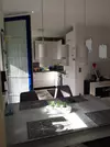 Wohn-Esszimmer mit offener Küc