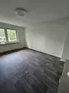 Wohnzimmer mit Balkon