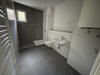 Badezimmer mit Fenster u. WM-A