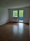 Wohnzimmer mit Balkon