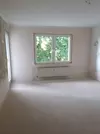 Wohnzimmer mit Balkonzugang