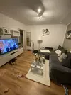 Wohnzimmer mit Balkon