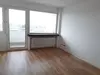 Wohnzimmer mit Balkon