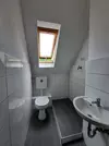 WC mit Waschmaschinenanschluss