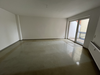 Wohnzimmer mit Balkon