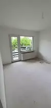 Wohnzimmer mit Balkon