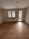 Wohnzimmer mit Balkonzugang