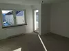 Wohnzimmer mit Balkon