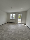 Wohnzimmer m. Zugang z. Balkon
