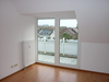 Wohnzimmer mit Balkon