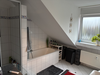 Bad mit Wanne und Duscher