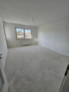 Wohnzimmer mit Balkon