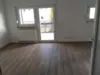Wohnzimmer mit Balkon