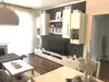 Wohnzimmer mit Balkon Bsp