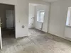 Wohnzimmer mit Küche