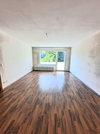 Wohnzimmer mit Balkonzugang